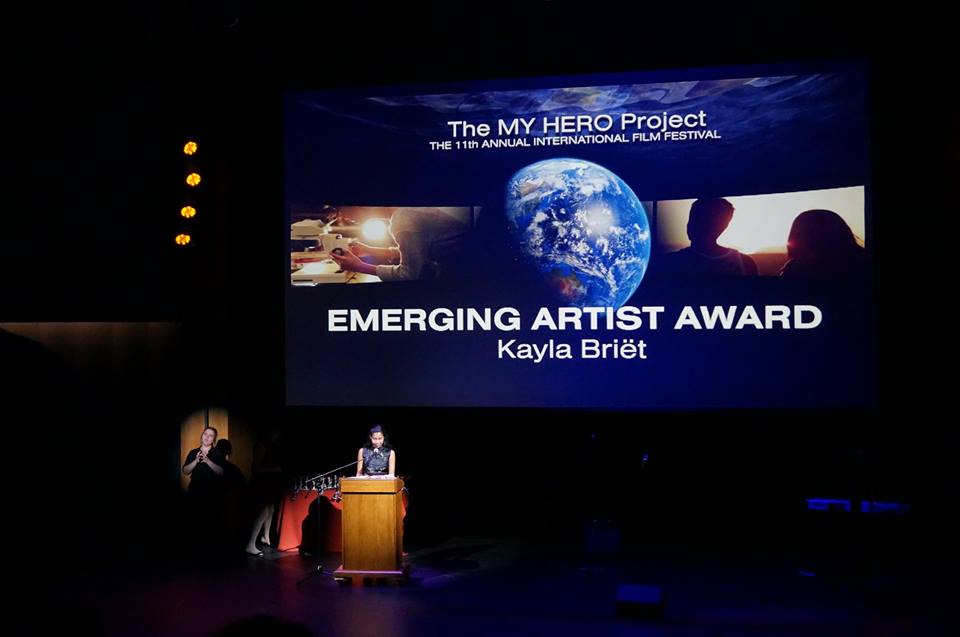 Kayla Briet accepts MHIFF Emerging Artist Award.